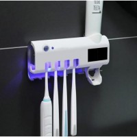 Dozator pentru pasta de dinti cu alimentare solara si sterilizator UV pentru periute