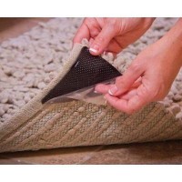 Set 4 triunghiuri adezive pentru covor, antialunecare