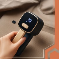 Aparat electric pentru indepartarea scamelor și reimprospătarea tesaturilor Aparat electric pentru indepartarea scamelor și reimprospătarea tesaturilor