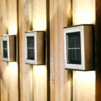 Set 4 lampi solare LED argintii, cu lumina bidirectionala, alb cald, IP55