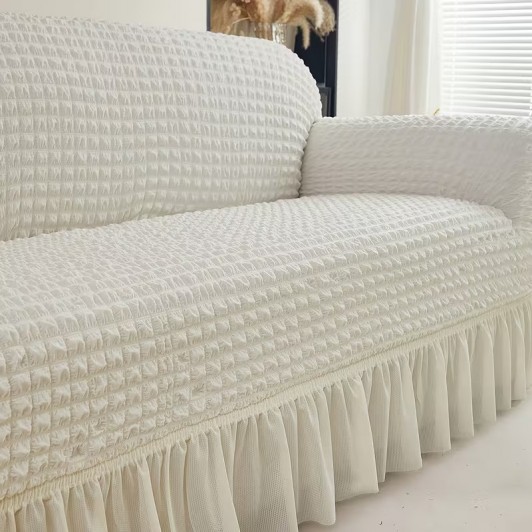 Husa creponata universala canapea 3 locuri, ivory, cu volane, bumbac, rezistenta la apa Husa creponata universala canapea 3 locuri, ivory, cu volane, bumbac, rezistenta la apa