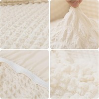 Husa creponata universala canapea 3 locuri, ivory, cu volane, bumbac, rezistenta la apa Husa creponata universala canapea 3 locuri, ivory, cu volane, bumbac, rezistenta la apa